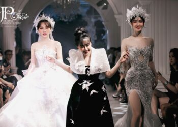 Hoa hậu Mai Phương trình diễn váy cưới dài 3.5m, nặng 12kg, phát biểu song ngữ đầy ấn tượng